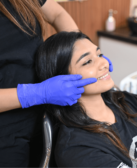 three girls are smiling